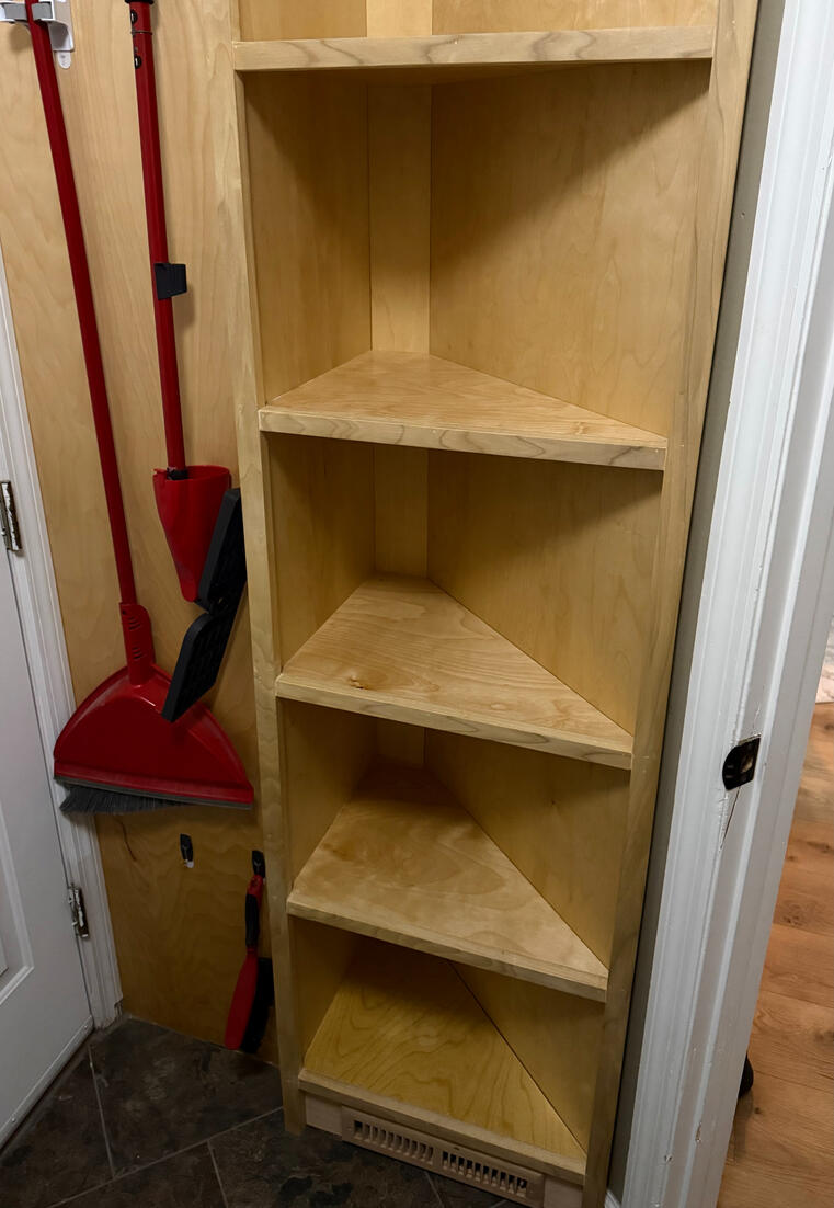 Lower section - Same small laundry room - Small corner was previously unusable space, turned into extra shelving. Lower section - Same small laundry room - Small corner was previously unusable space, turned into extra shelving.