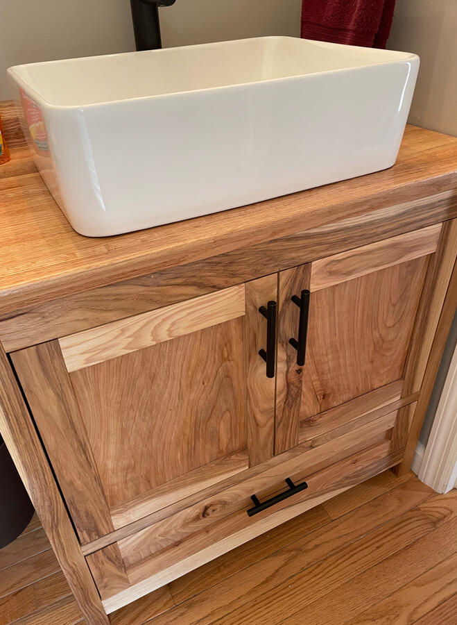 Hickory vanity with white oak top and vessel sink