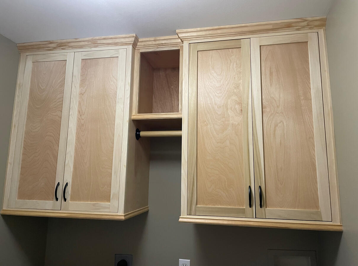 Custom fit laundry cabinets in birch
